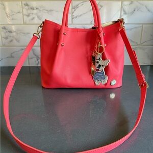 Vince Camuto Coral Handbag with Dog Charm